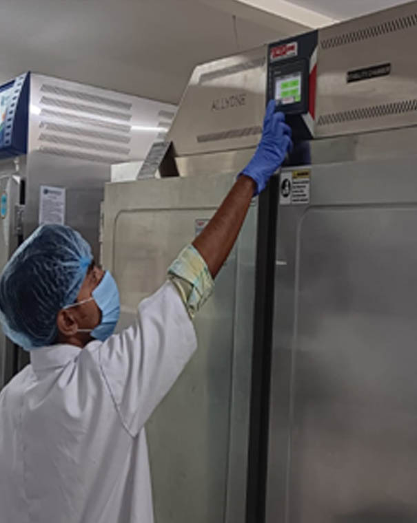 Birthday setup with pink and white balloon arch