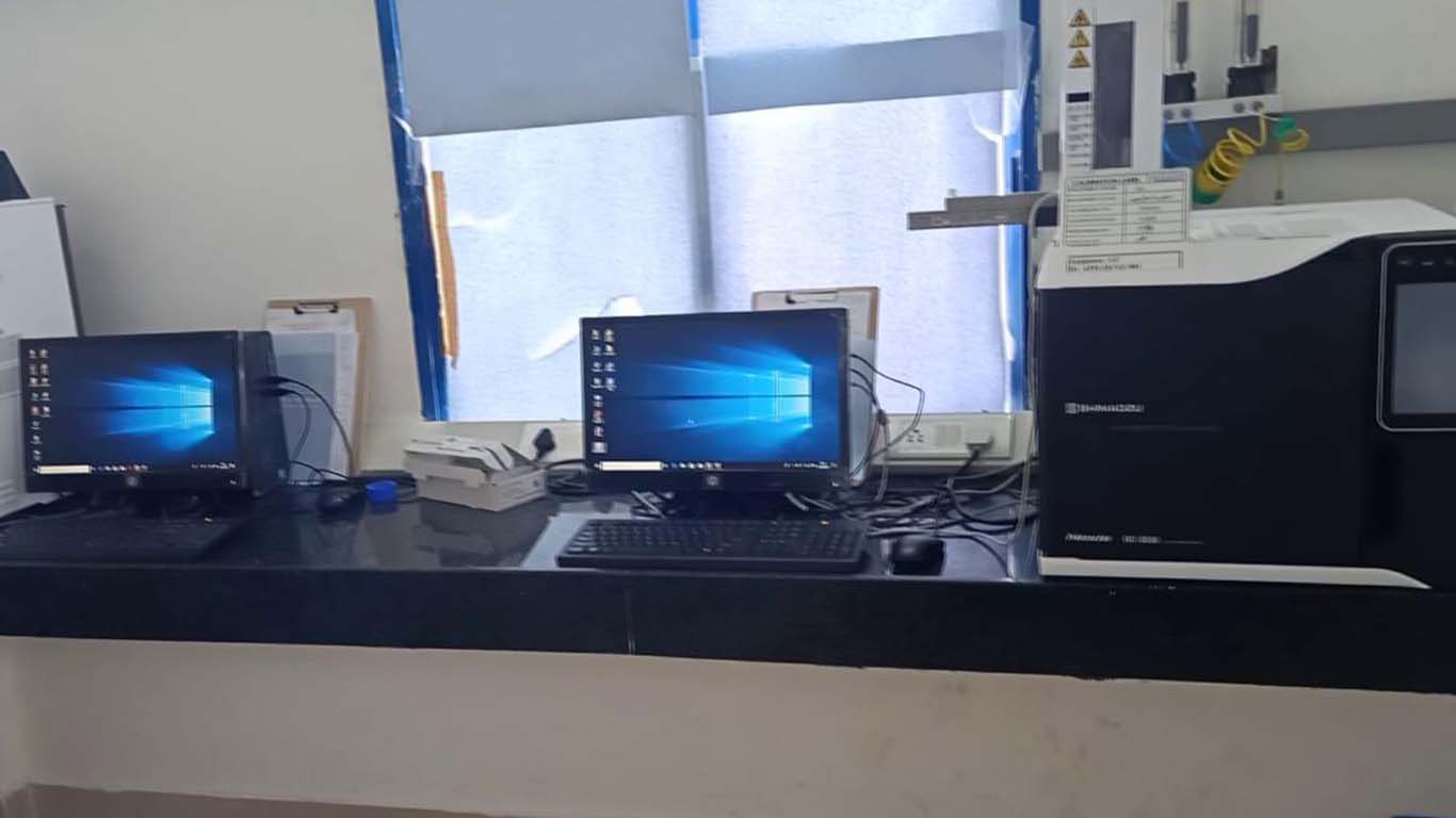 Event space with projector screen and floor balloons