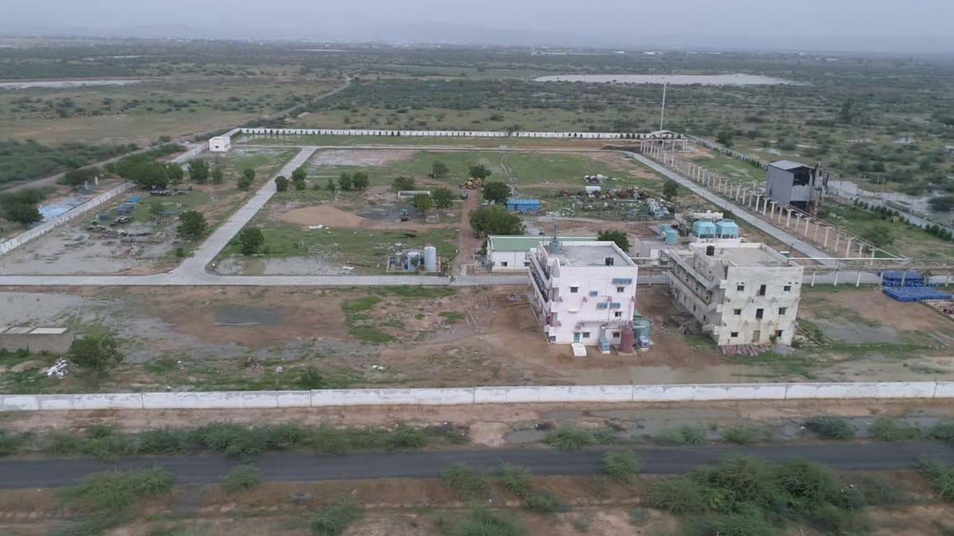 Event space with projector screen and floor balloons
